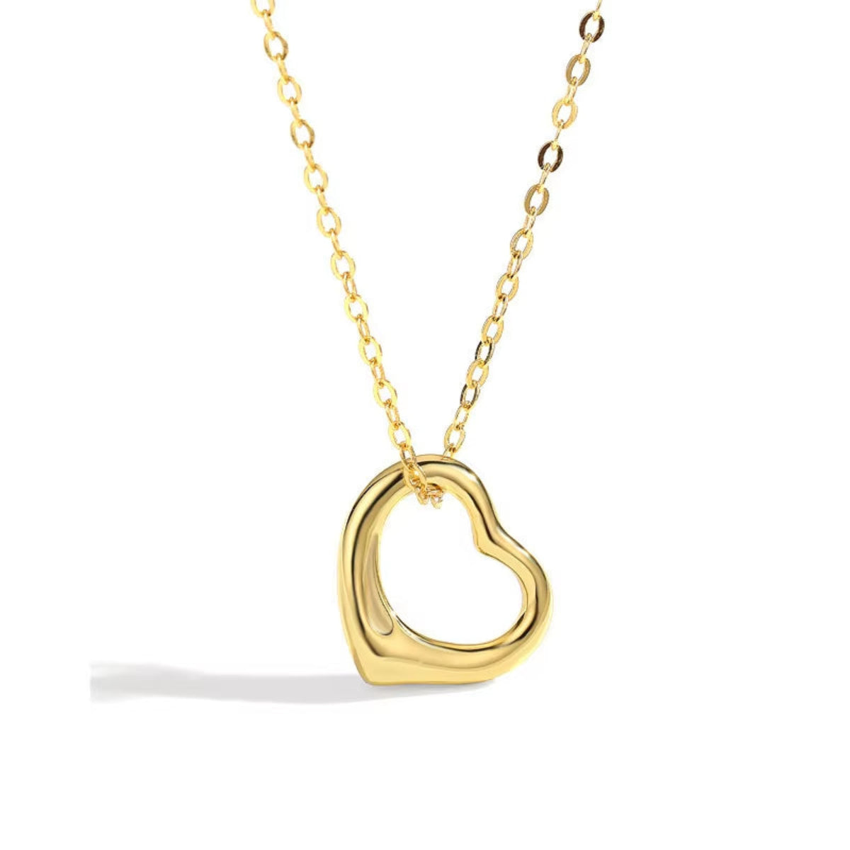 Gold heart pendant with blue background.