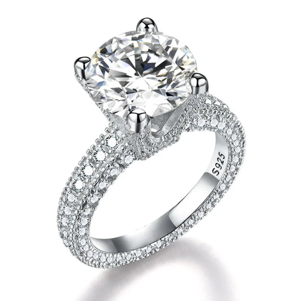 Silver ring with large solitaire stone and pave crystal setting.