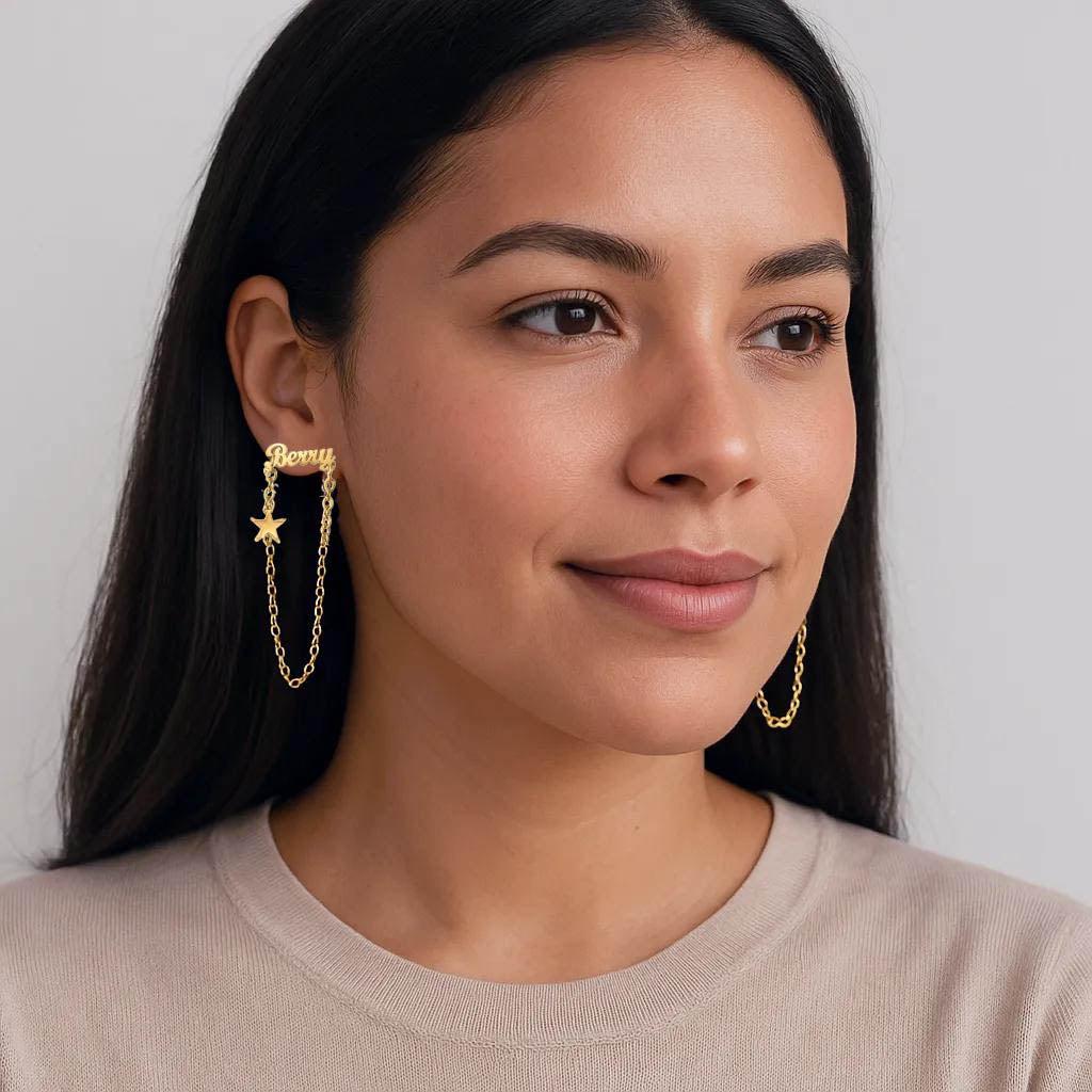Model wearing star-shaped custom name earrings