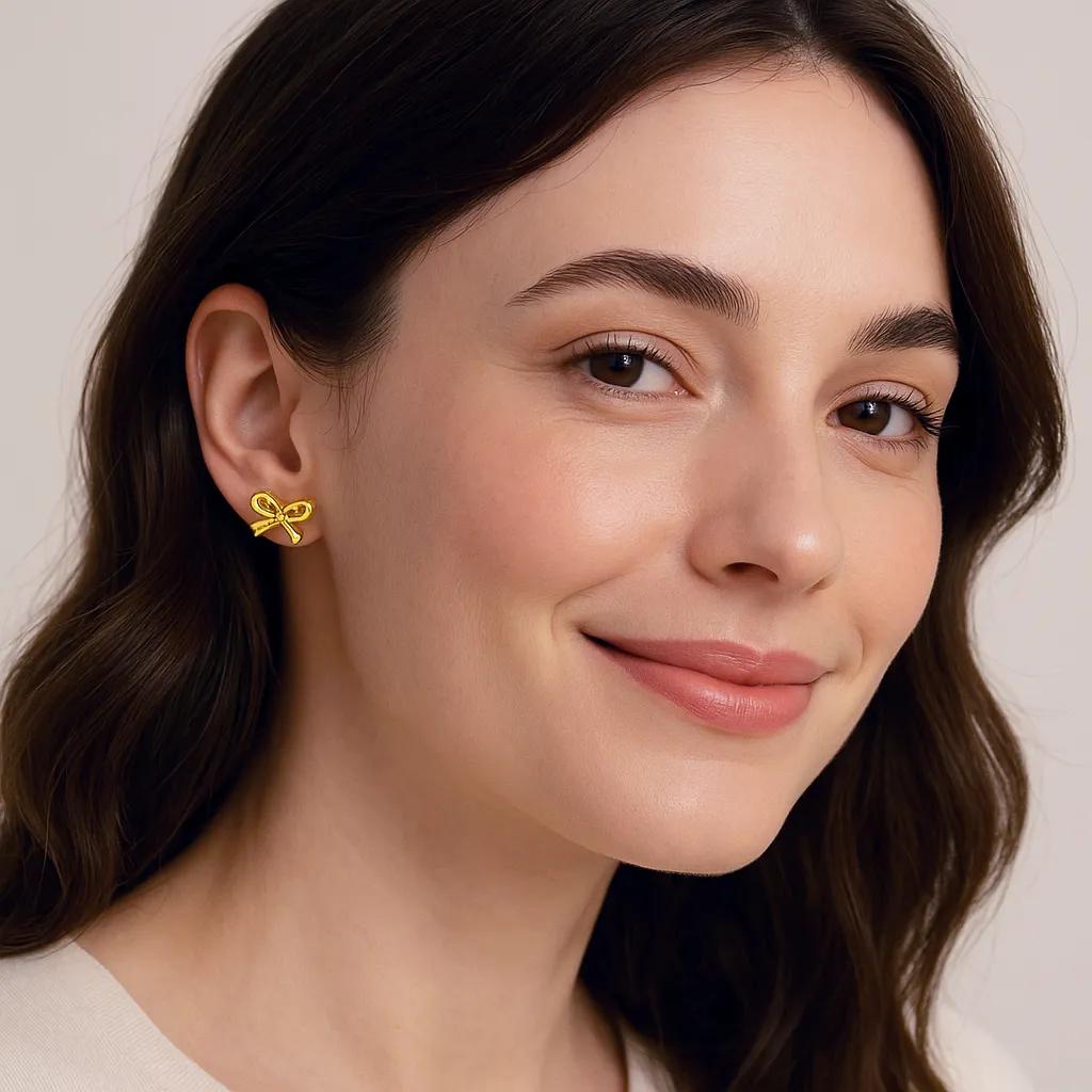 Golden Grace: Bow-Tie Stud Earrings