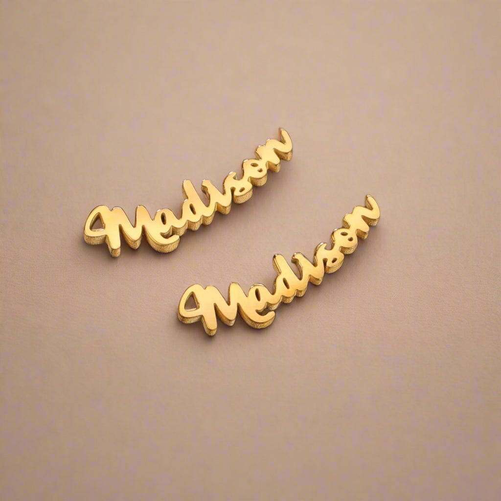 Elegant gold name earrings