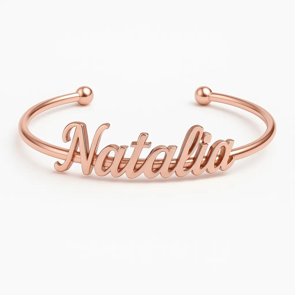 Rose gold bracelet with 'Natalia' engraved on a white background