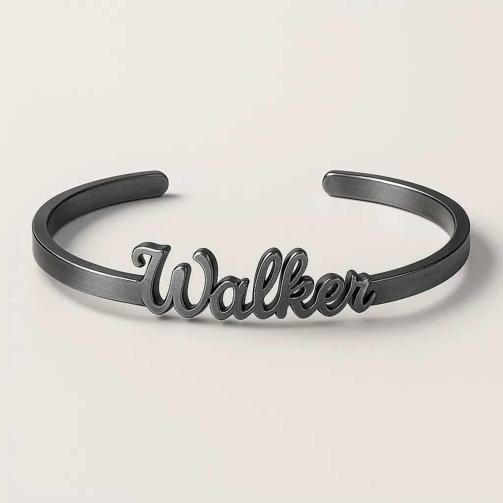 Black 'Walker' bracelet on a light beige background
