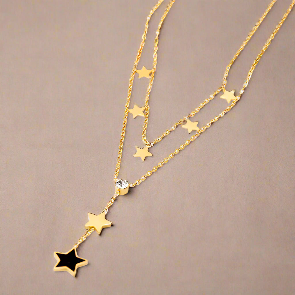 Celestial Contrast: Black & White Star Pendant Necklace