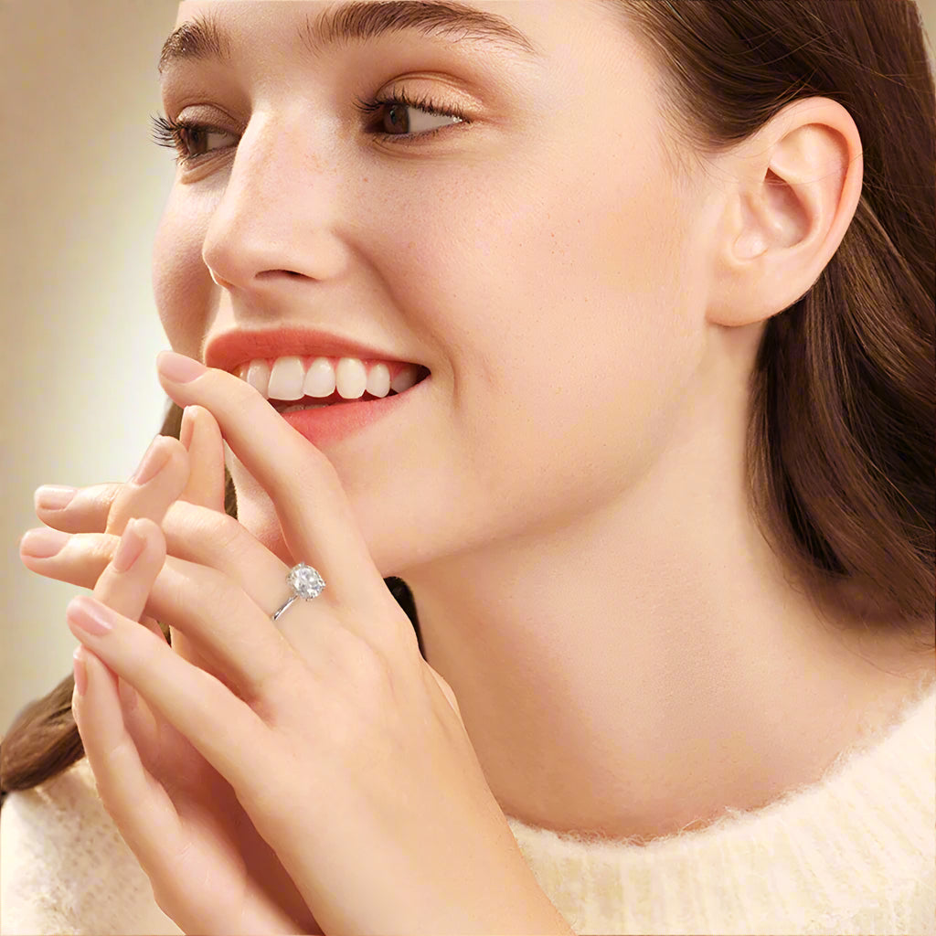 Elegant solitaire ring with sparkling round-cut stone.
