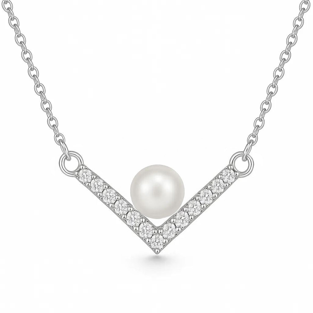 Pearl necklace with diamond accents on a white background