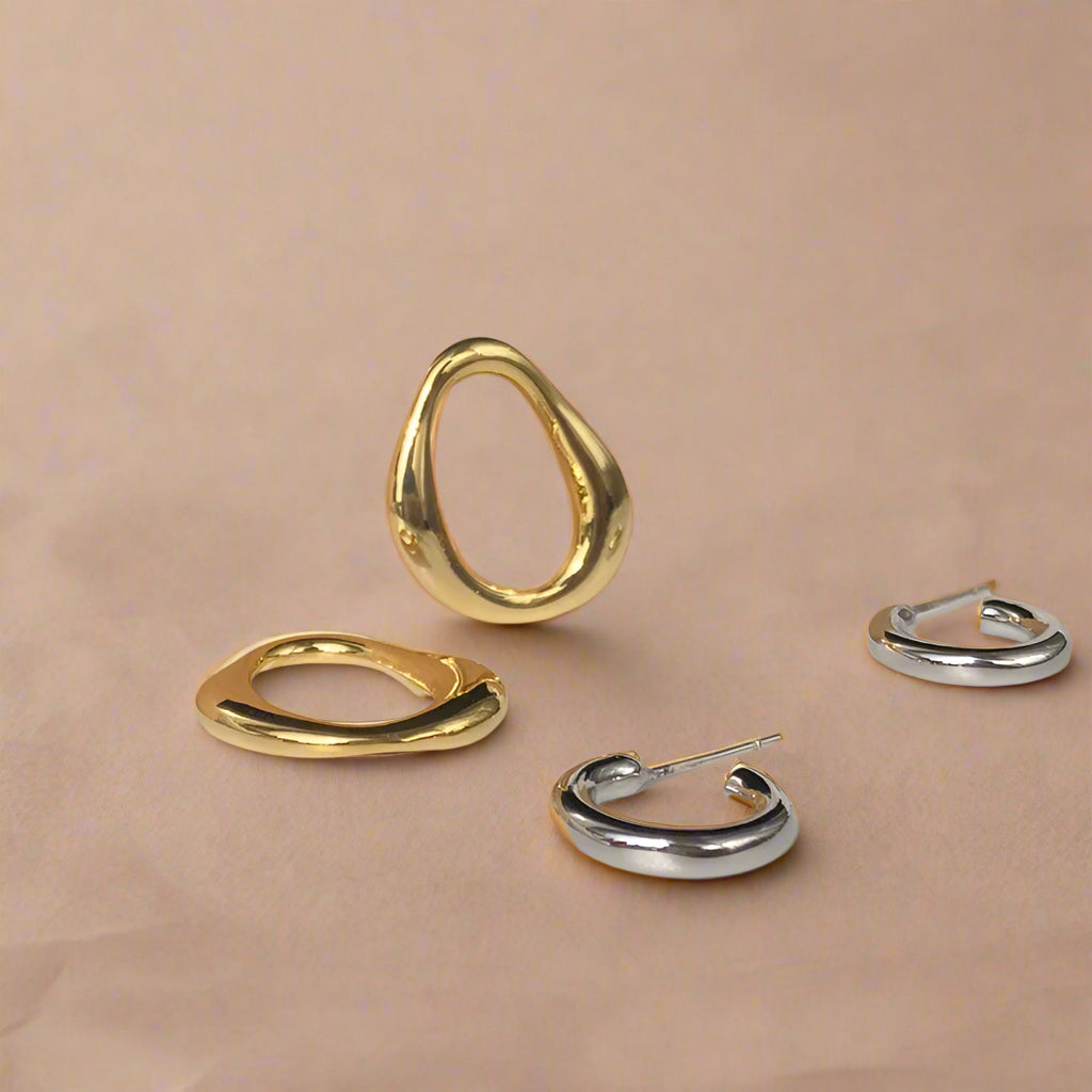 Dual Flow: Gold & Silver Abstract Drop Earrings