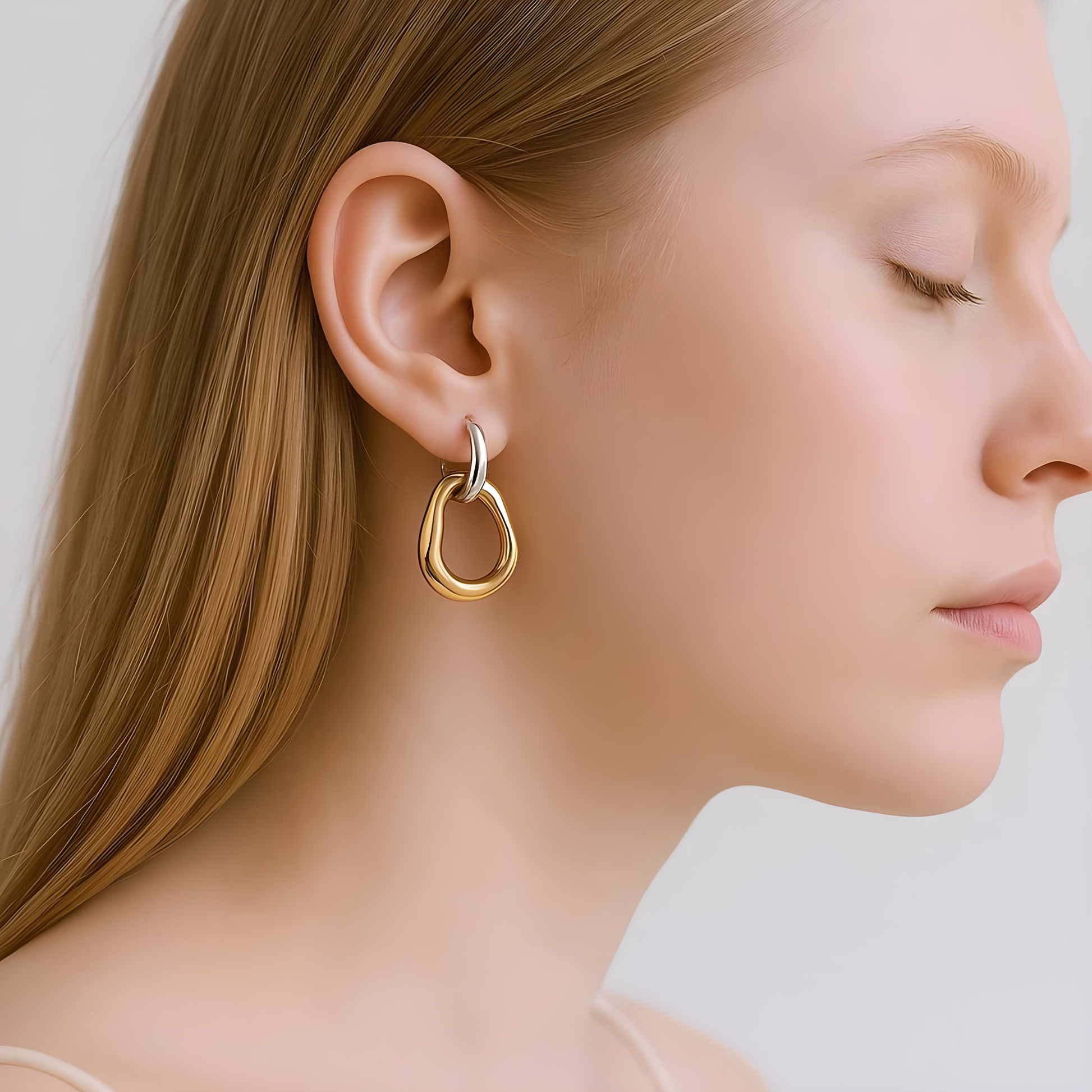 Dual Flow: Gold & Silver Abstract Drop Earrings