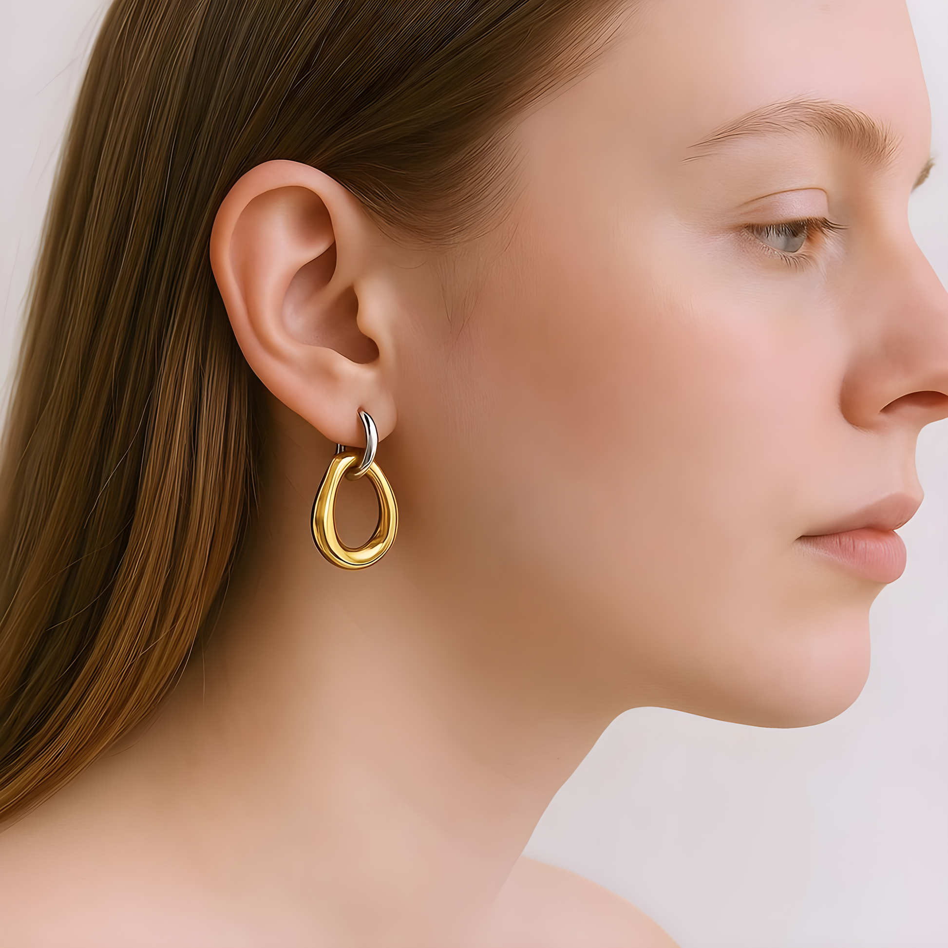 Dual Flow: Gold & Silver Abstract Drop Earrings