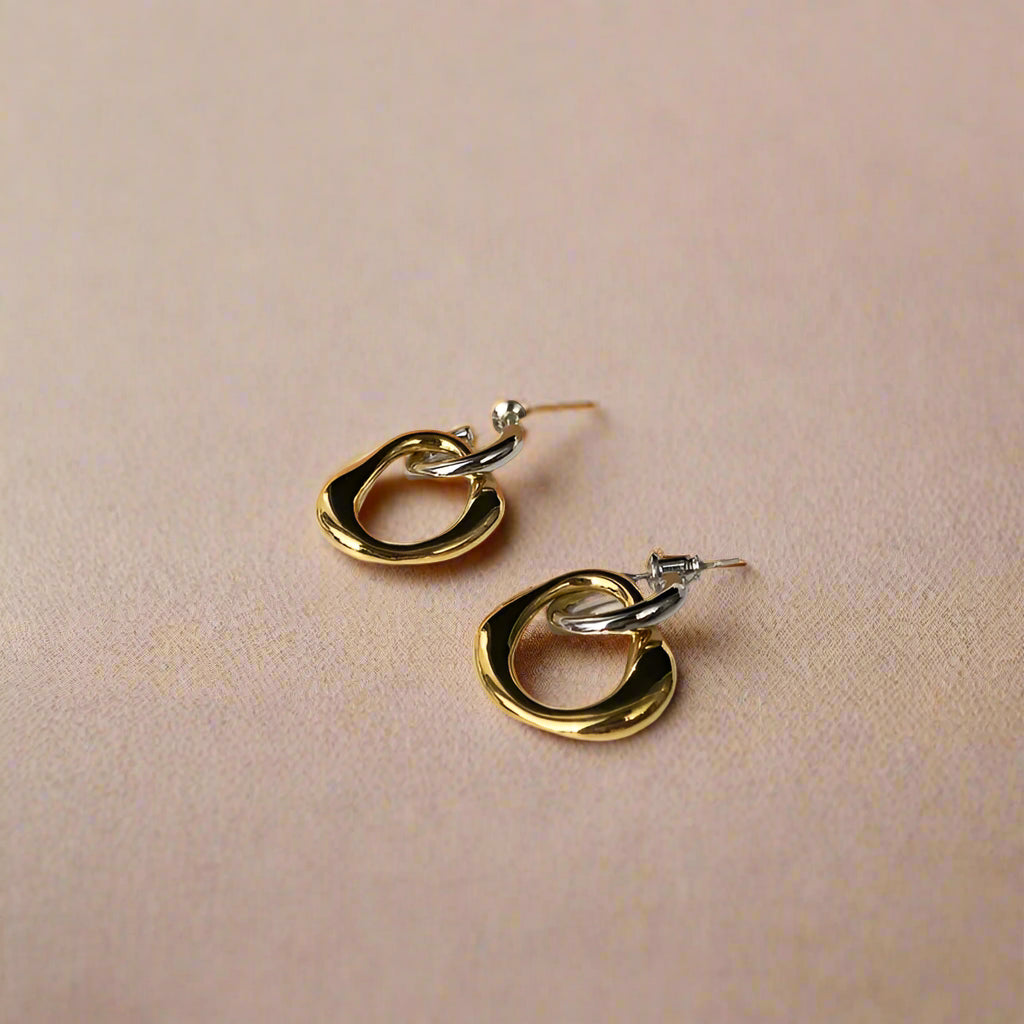 Dual Flow: Gold & Silver Abstract Drop Earrings