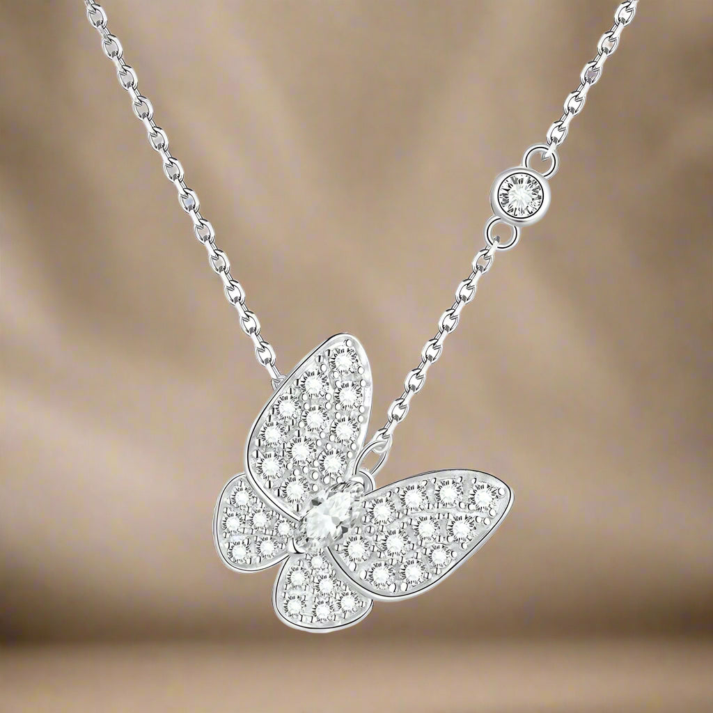 Elegant crystal design in butterfly shape on necklace.