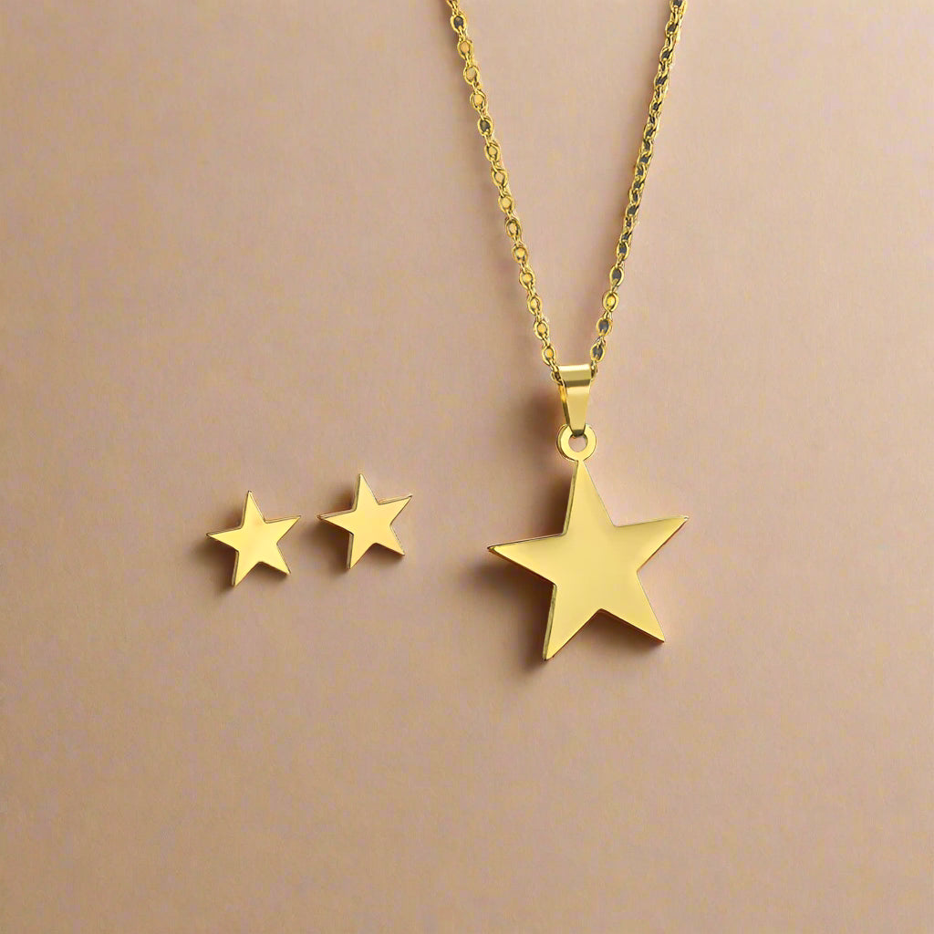 Gold star pendant necklace with matching earrings