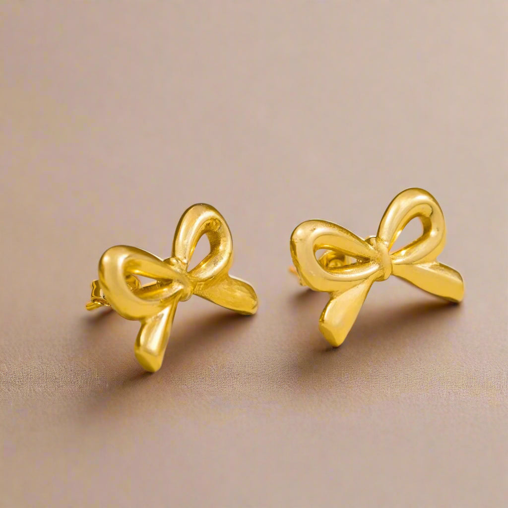 Golden Grace: Bow-Tie Stud Earrings