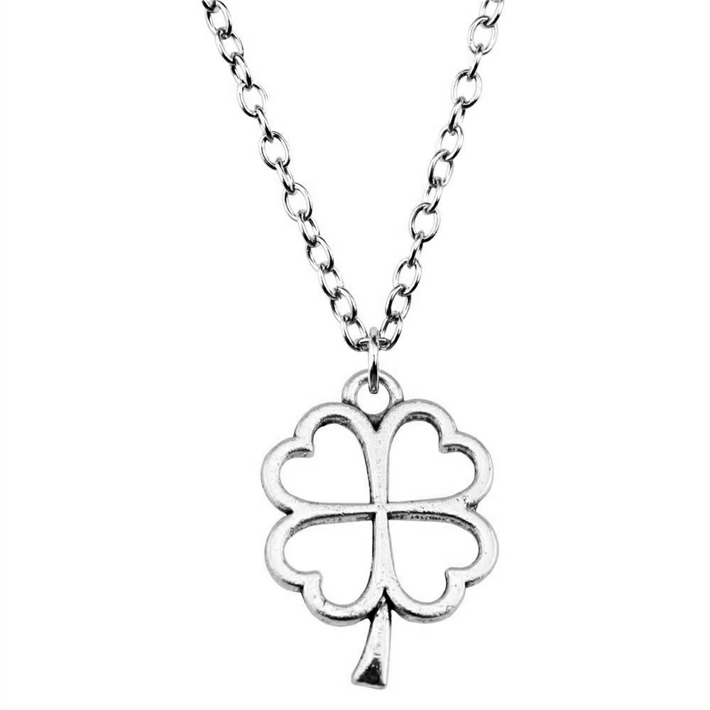 Elegant silver necklace with clover design charm.