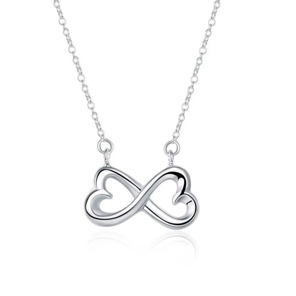  Elegant necklace with infinity and heart design in shimmering silver.