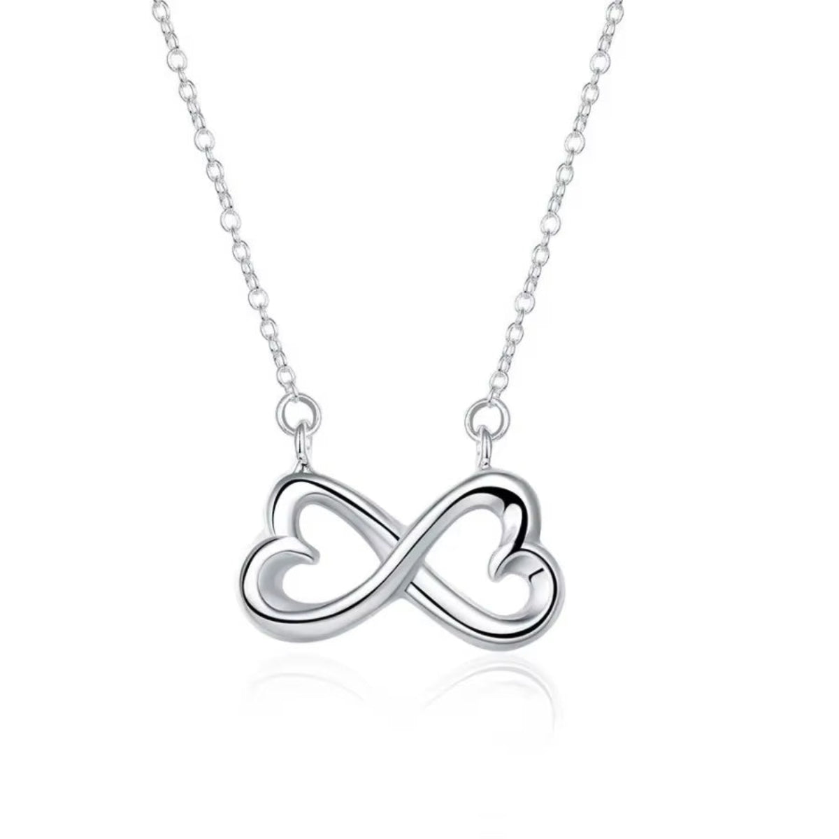  Elegant necklace with infinity and heart design in shimmering silver.