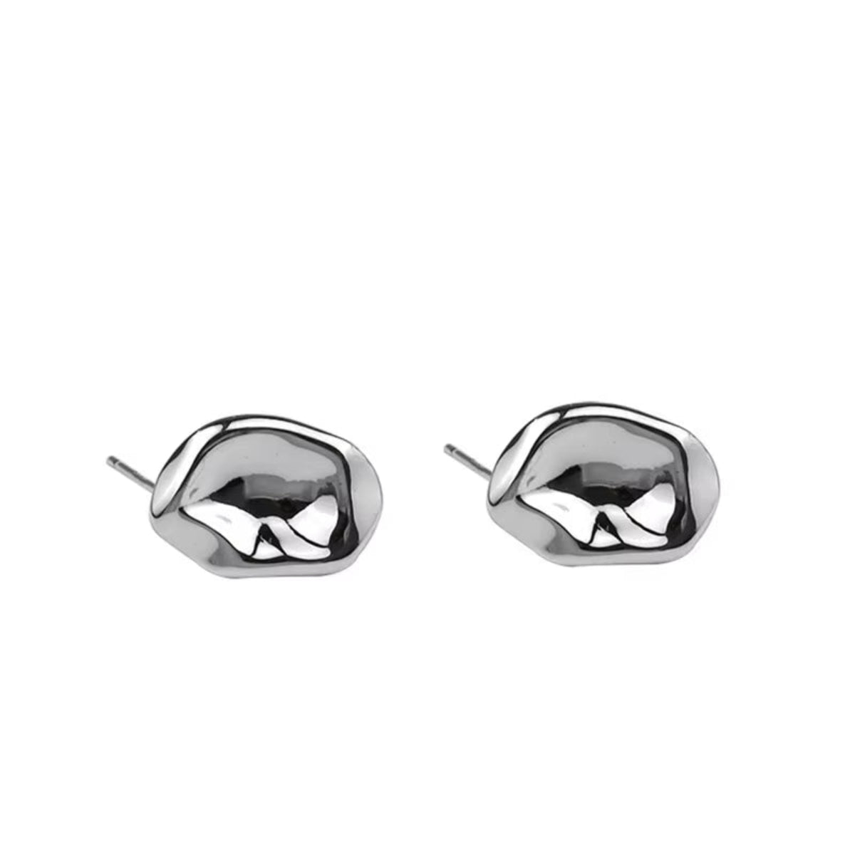 Close-up of molten-shaped earrings being held by hand for detail view