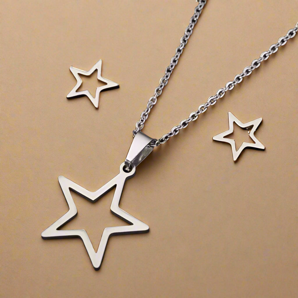Gift packaging of gold and silver star necklace set
