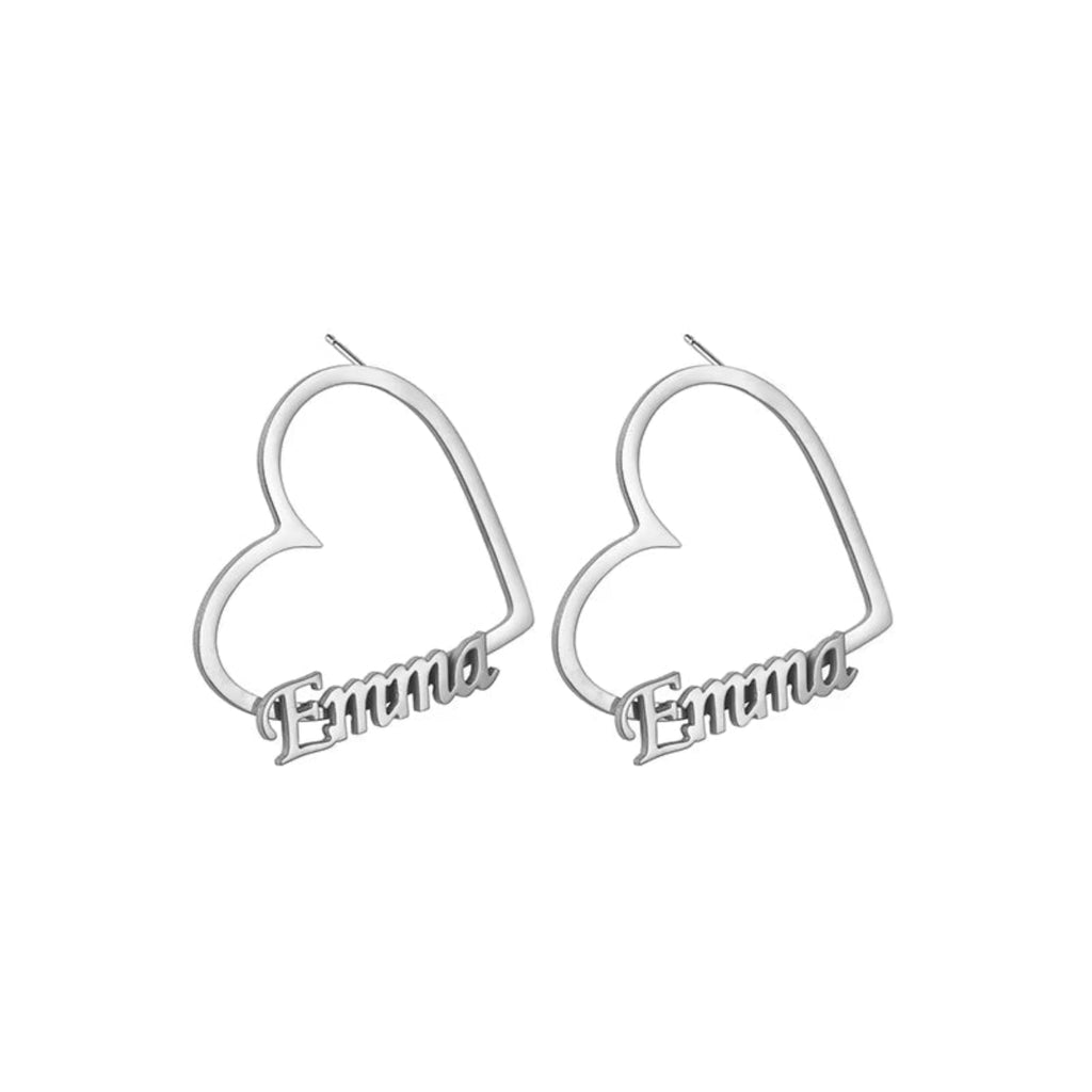 Heart-shaped minimalist earrings in a radiant metallic finish.