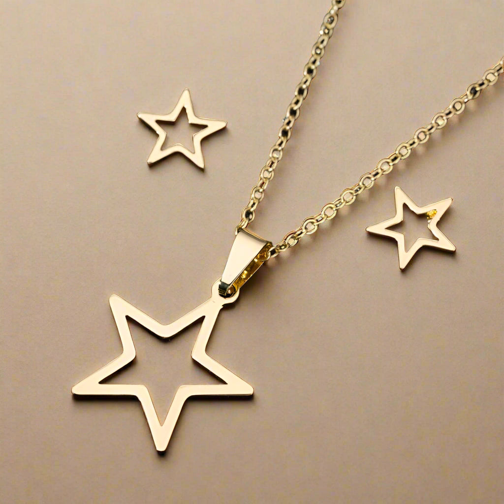 Star pendant necklace and earrings set – gold finish