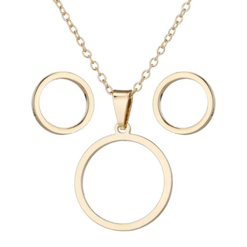 Gold stainless steel circle jewelry set on black background – necklace and stud earrings