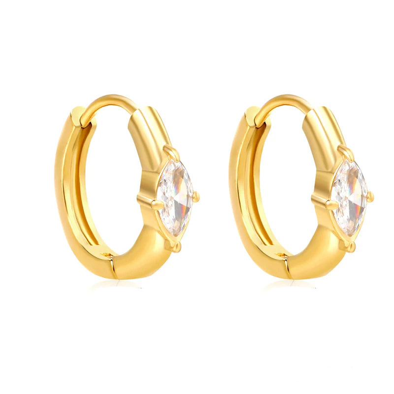 Gold hoop earrings with clear gemstones on a white background