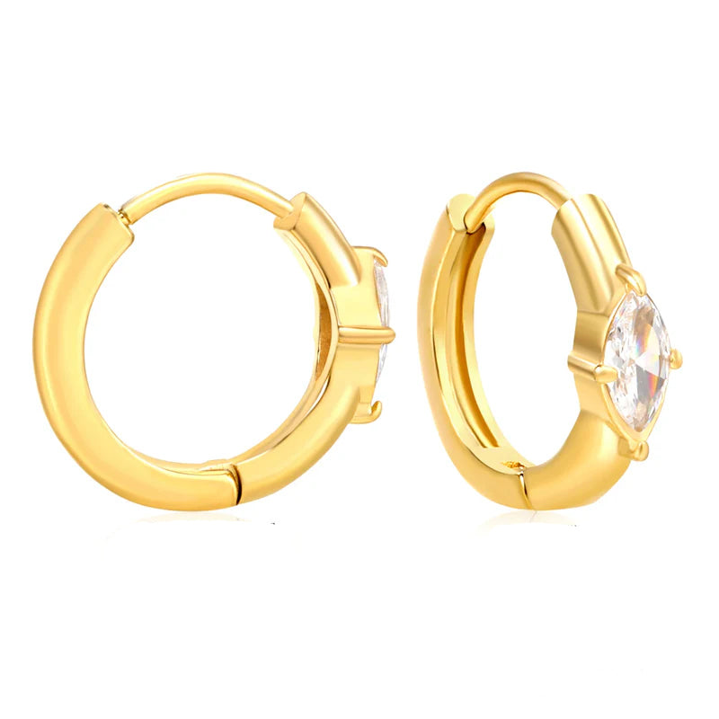 Gold hoop earrings with a central gemstone on a white background