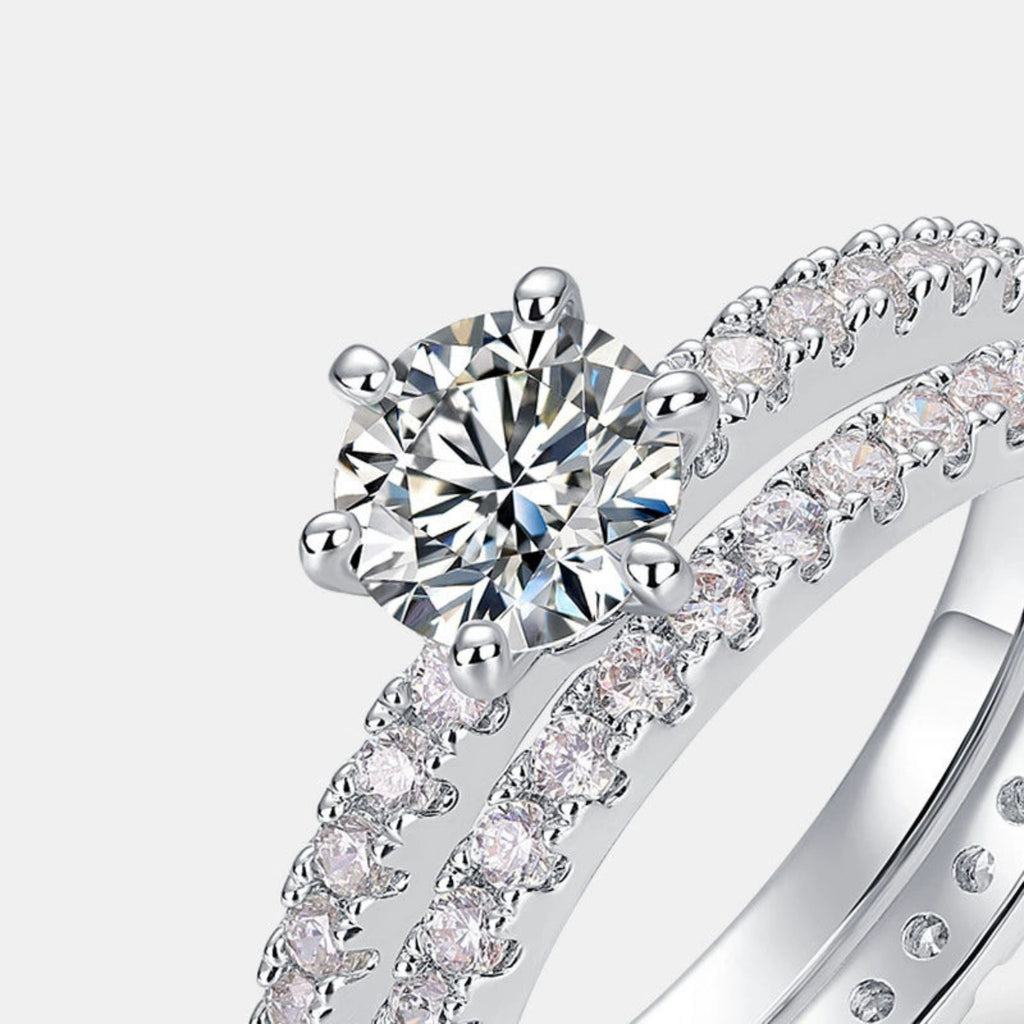  Close-up of a sterling silver ring set with glittering stones.