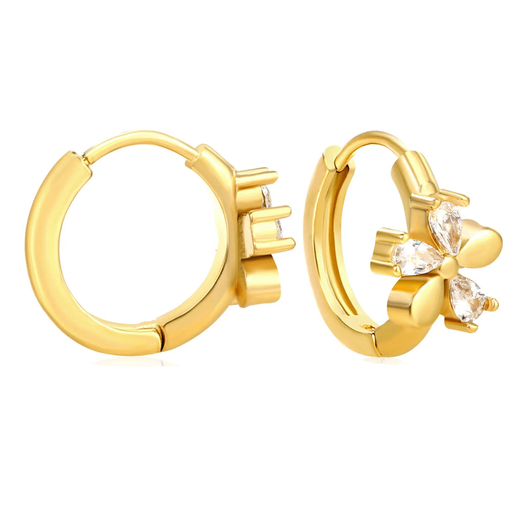 Gold hoop earrings with a decorative element on a white background