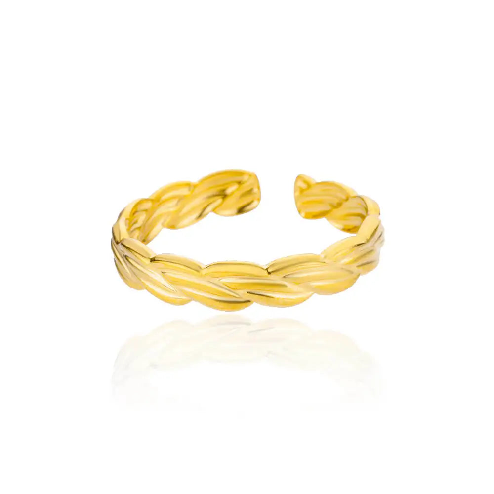  Gold woven open cuff bracelet on white background.