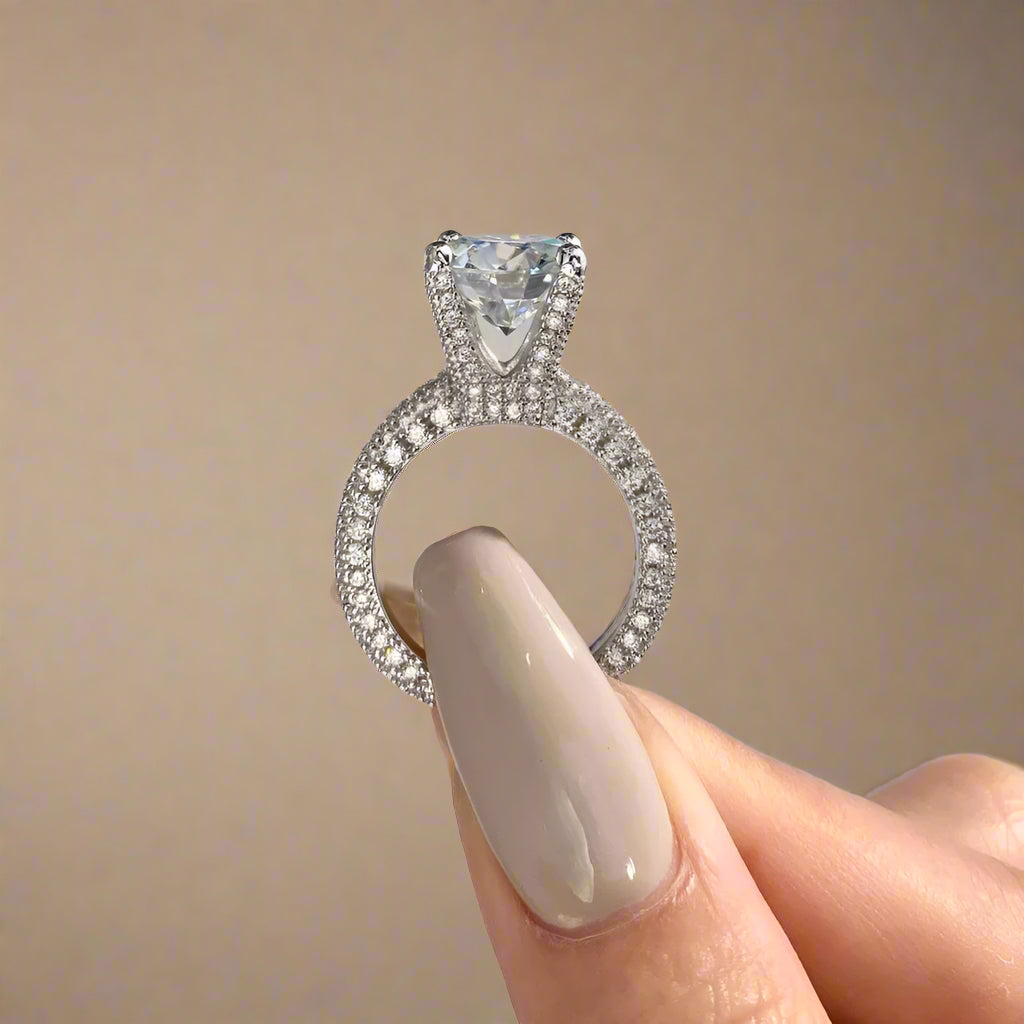 Silver ring with large solitaire stone and pave crystal setting.
