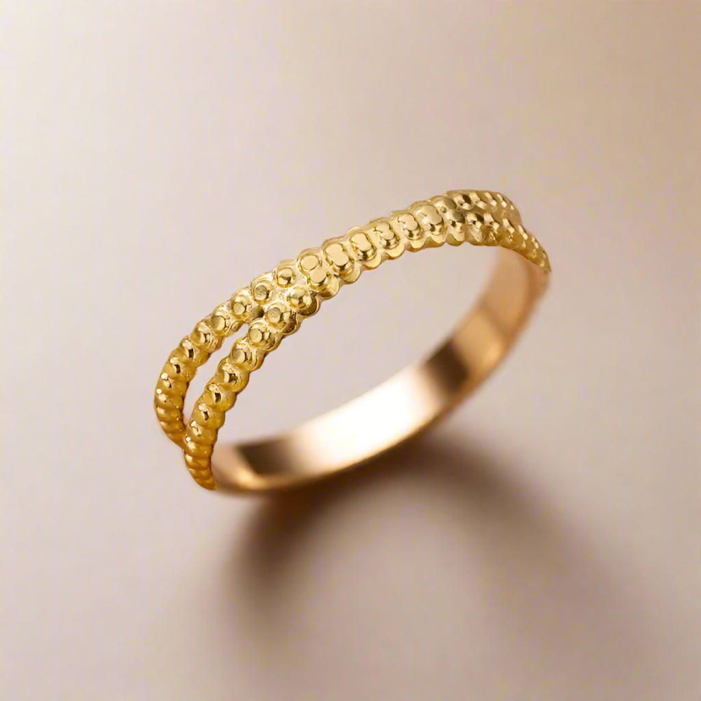 Gold beaded dual-band adjustable ring.