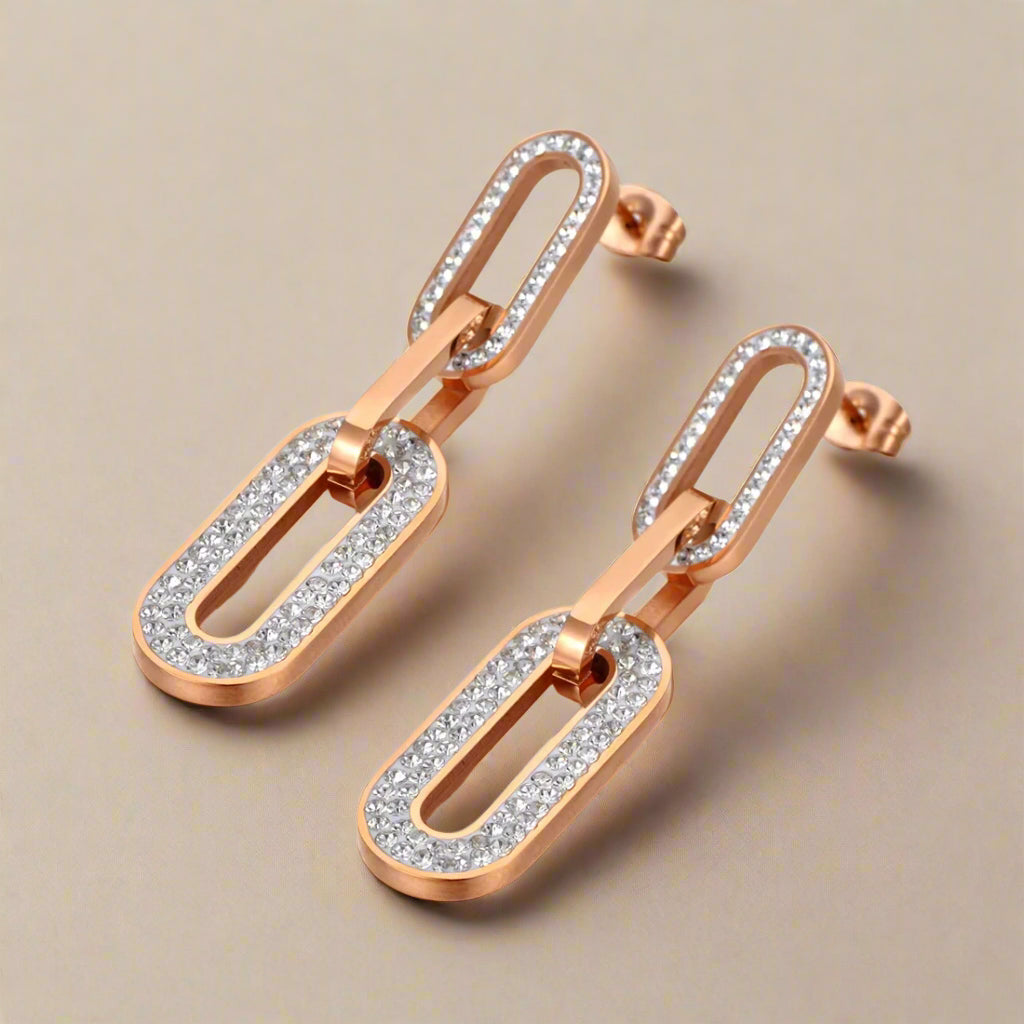 Glamorous gold chain earrings displayed on product card