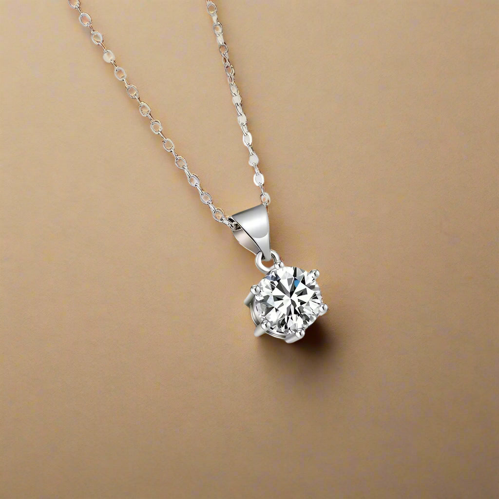 Lumière Moissanite Pendant Necklace displayed on a white background to emphasize its design