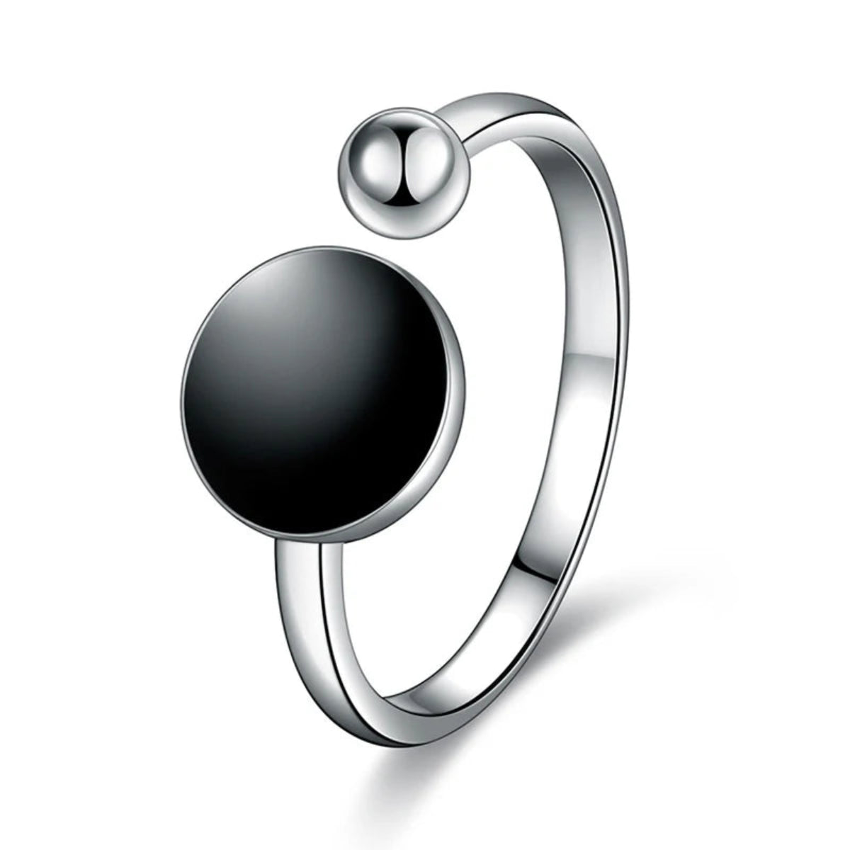 Minimalist ring with bold black resin center – flat lay display