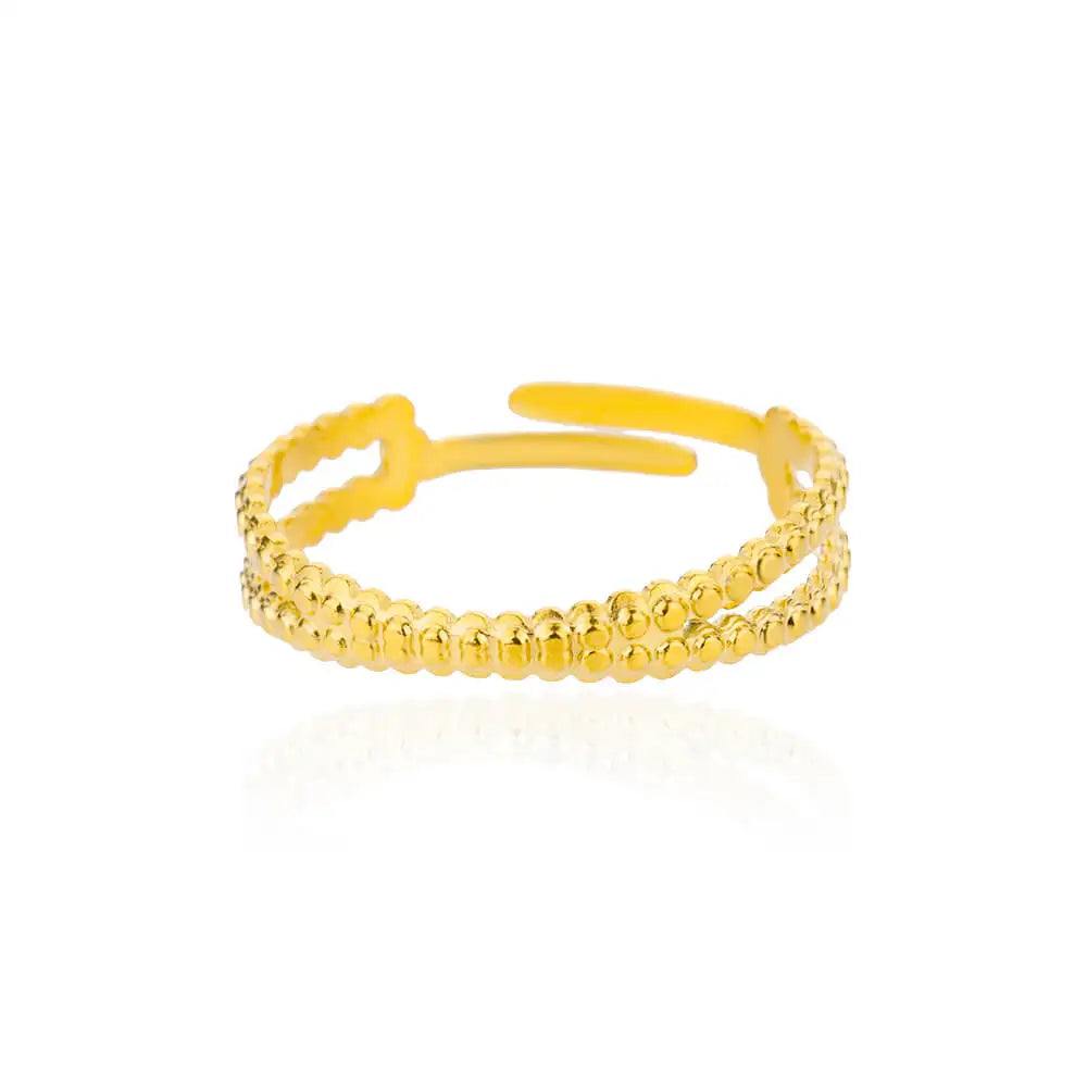 Elegant gold-plated ring on white background.  