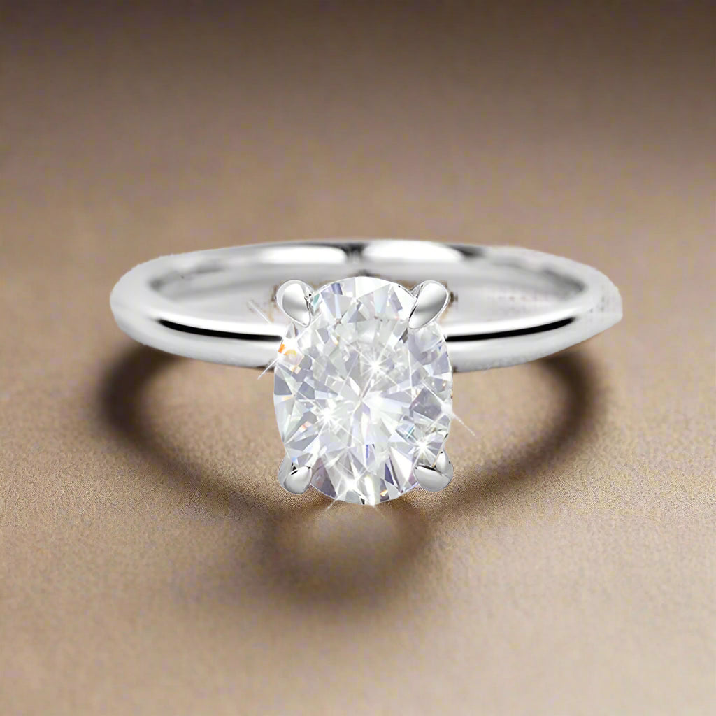 Elegant solitaire ring with sparkling round-cut stone.