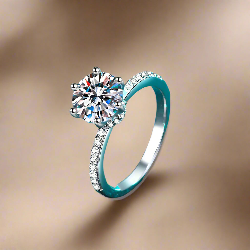 2.	1ct brilliant-cut moissanite solitaire ring with pavé band in sterling silver