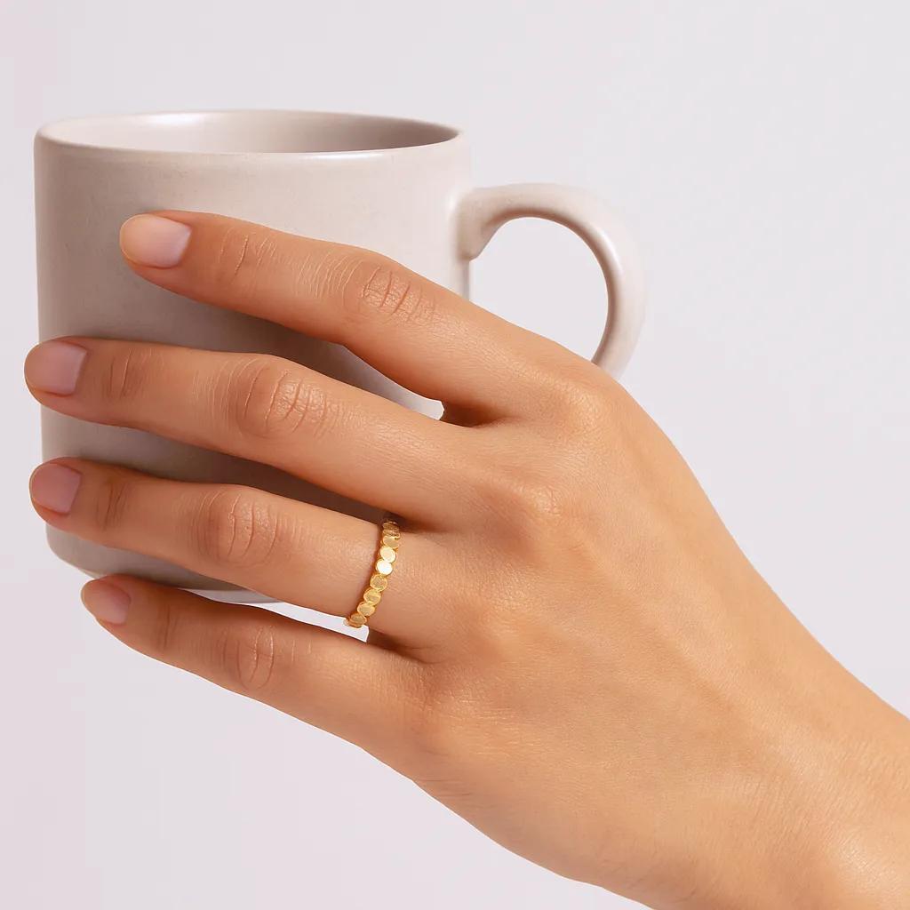 Sleek, minimalist gold ring with adjustable fit