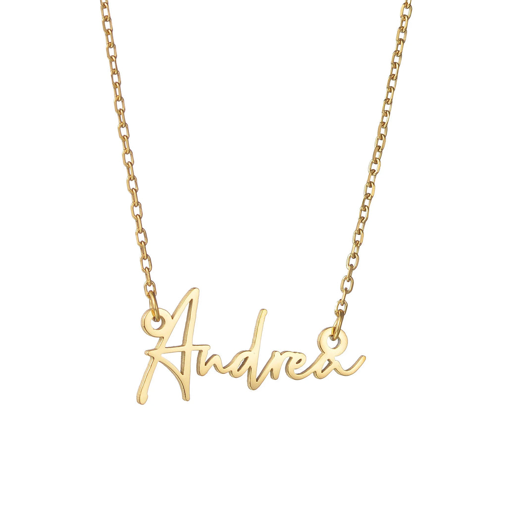 Close-up of gold chain with name pendant.