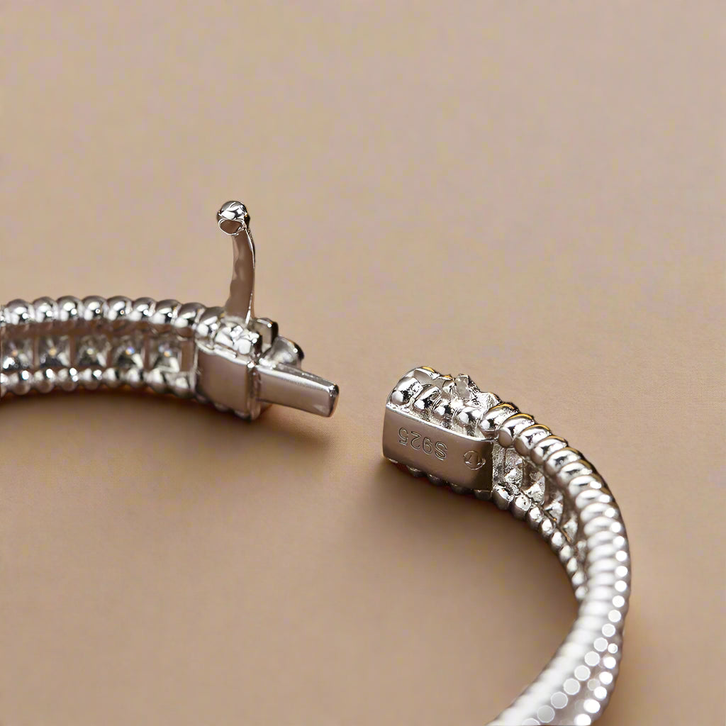 Eternal Glow Bangle Bracelet displayed in a luxury gift box.