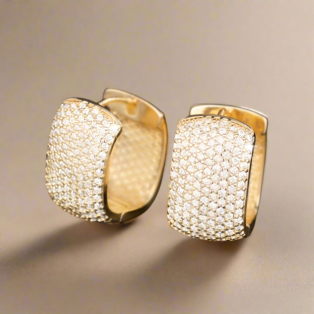 Gold-tone U-shaped earrings with brilliant CZ stones