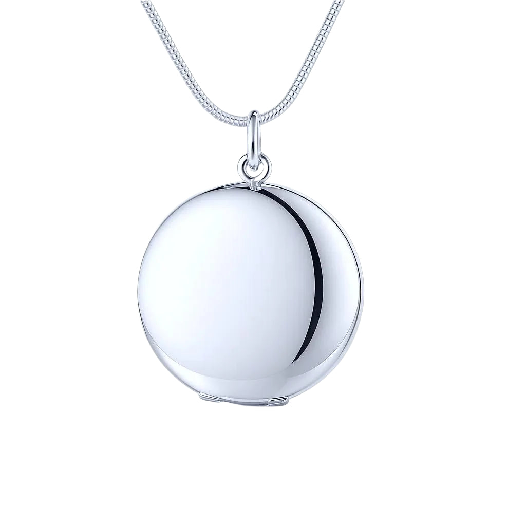 Polished silver circle pendant on a fine chain.  