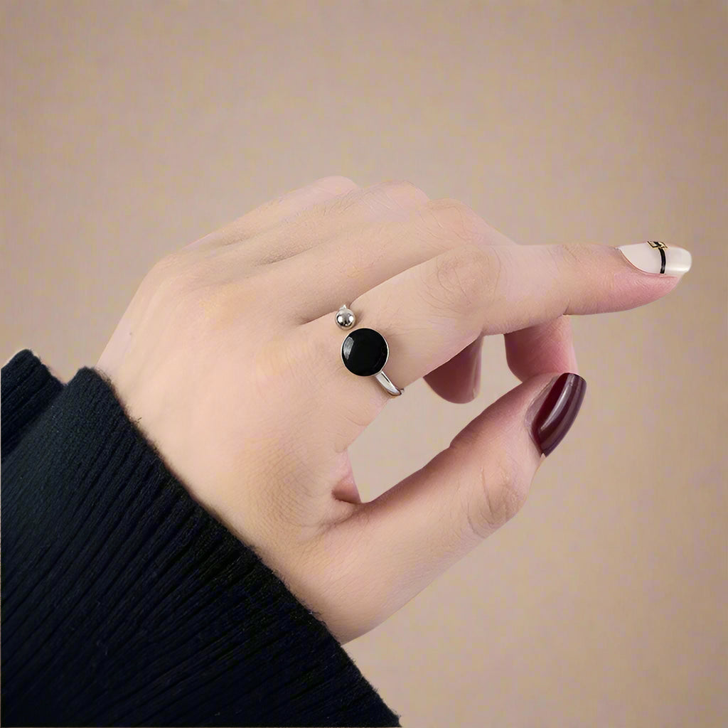 Model writing with the ring on – casual lifestyle image