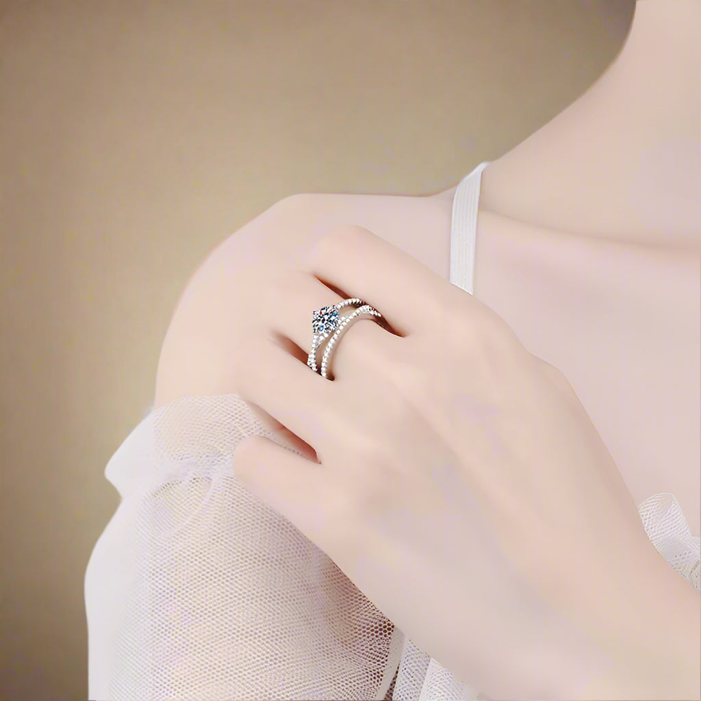Side view of elegant white gold plated zircon ring.  