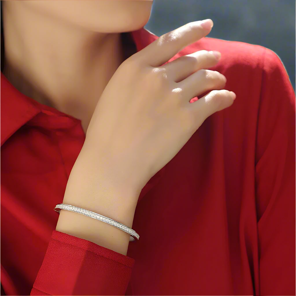 Close-up of adjustable bangle design with brilliant moissanite detailing