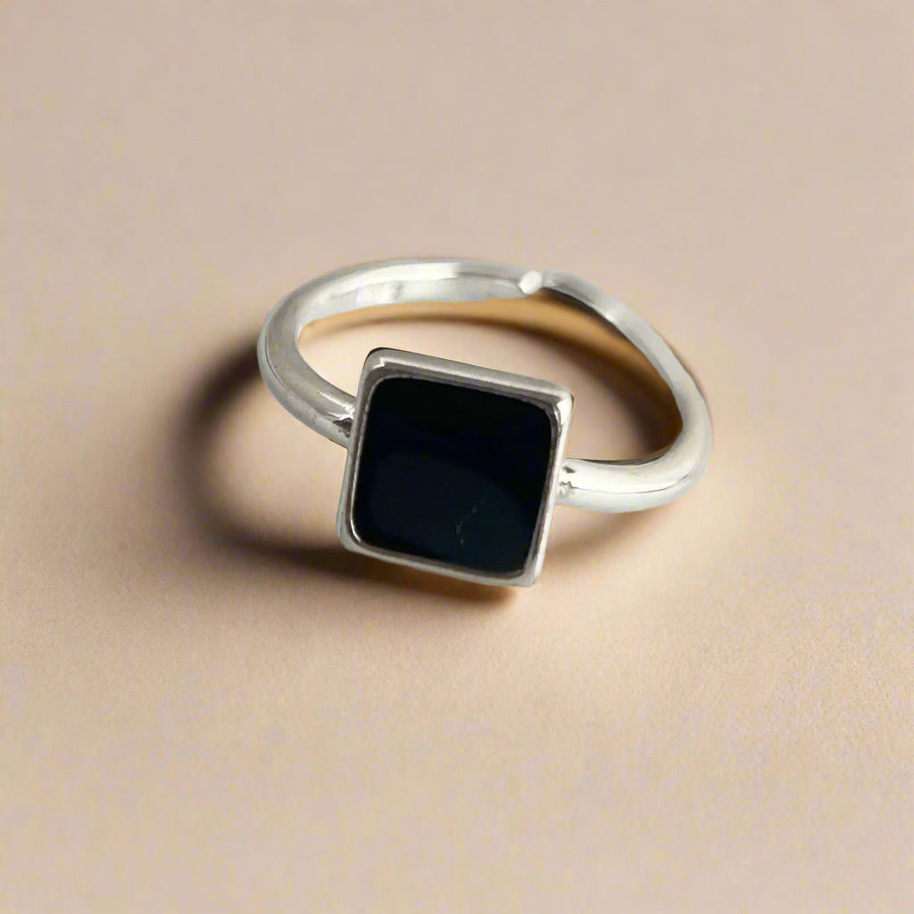 Sterling silver square stone ring shown from side angle