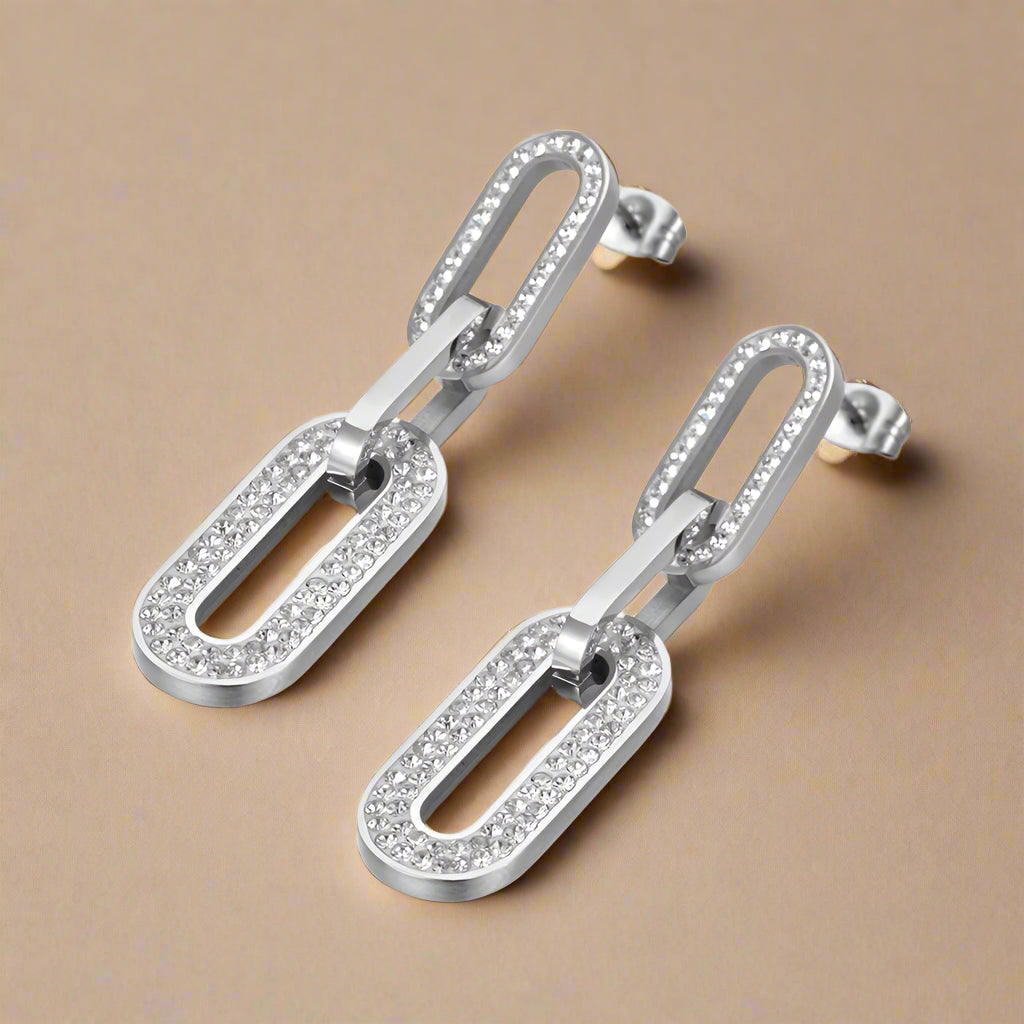 Side-by-side gold and silver modern chain earrings