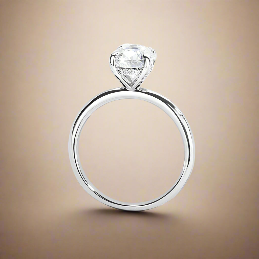 Minimalist silver ring showcasing dazzling stone centerpiece.