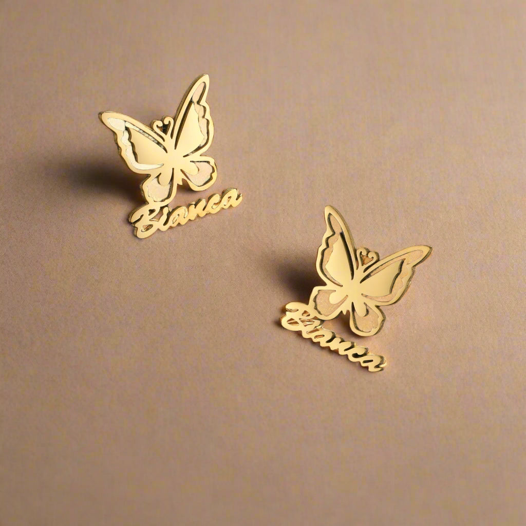 Gold butterfly earrings with handwritten name